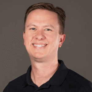 a man smiling for the camera