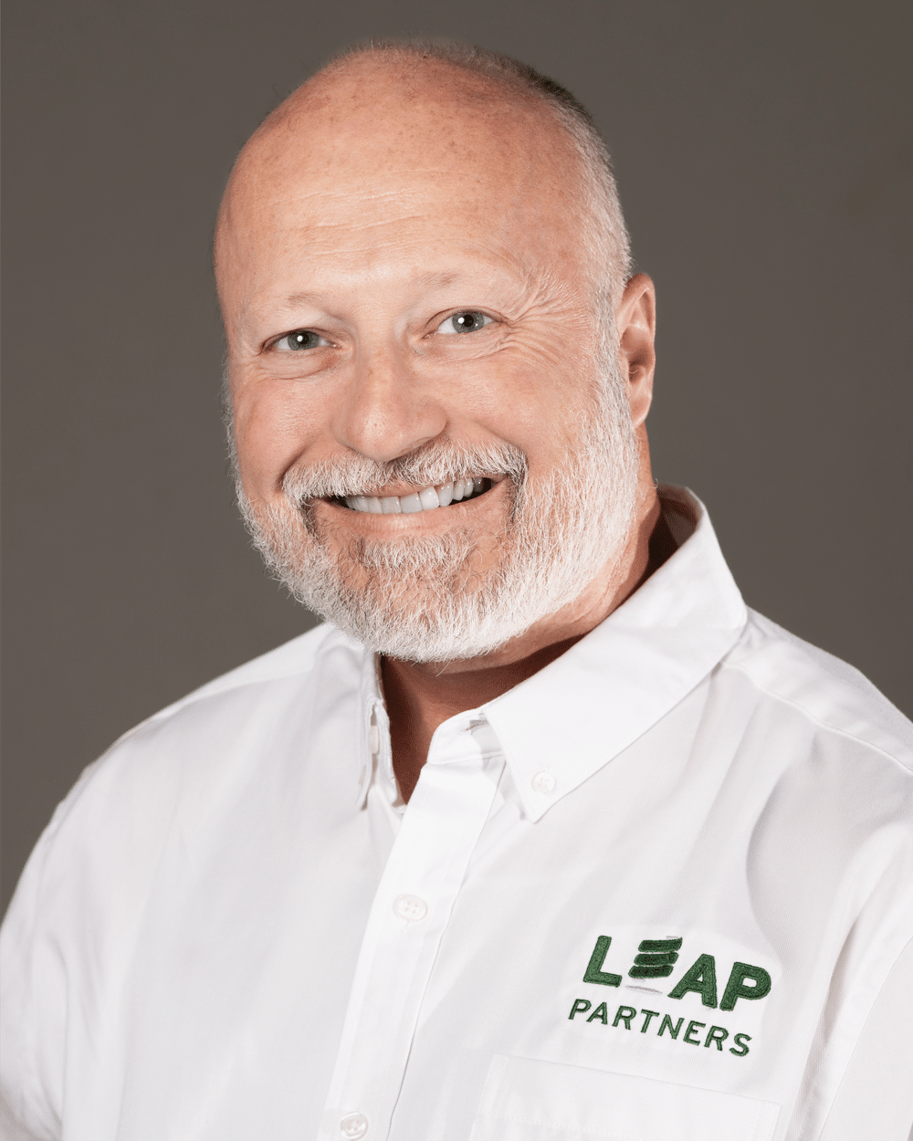 a man smiling for the camera