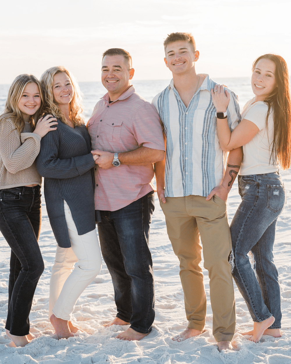 a group of people posing for the camera
