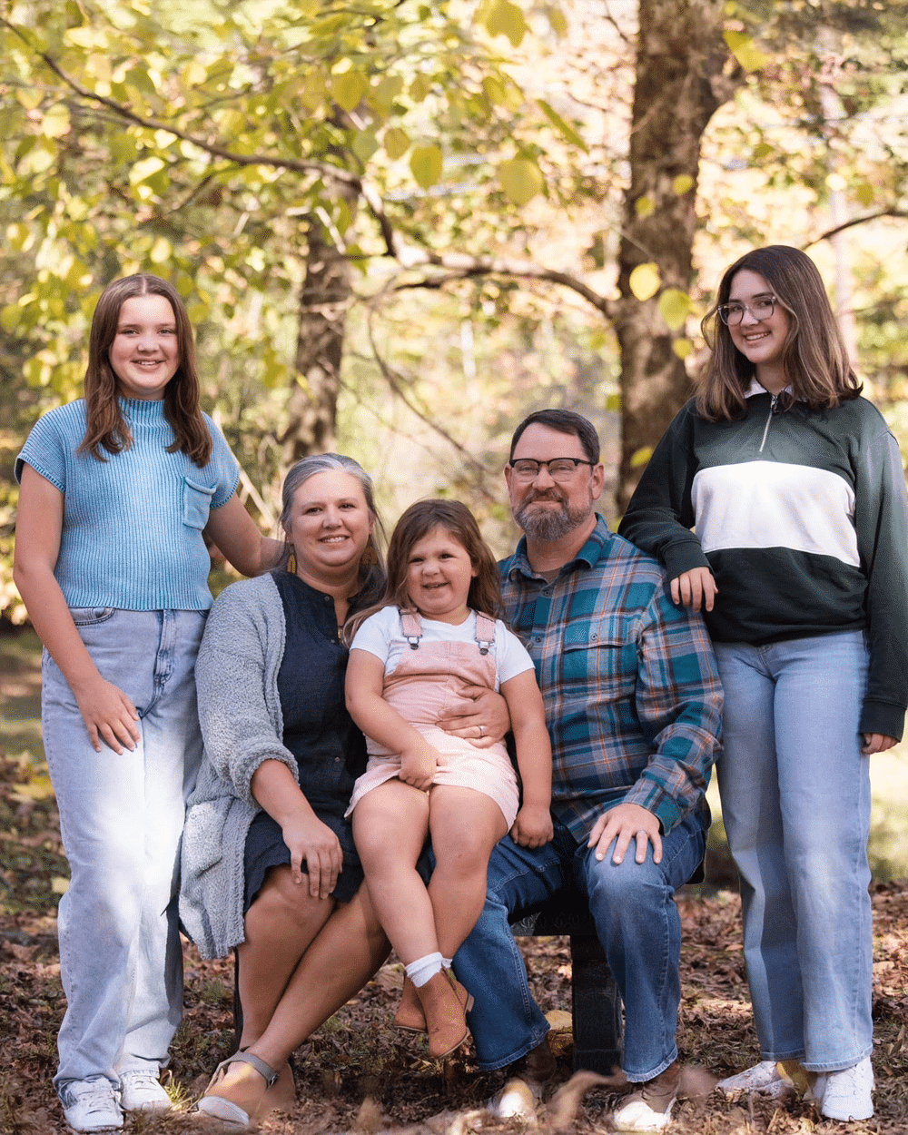 a group of people posing for the camera