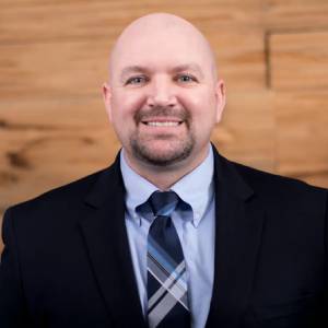 a man wearing a suit and tie